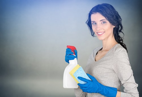 Team of Hannah House Maids cleaning an office